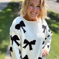 The Holly Bow Sweater
