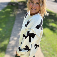 The Holly Bow Sweater