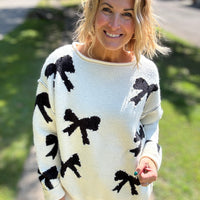 The Holly Bow Sweater