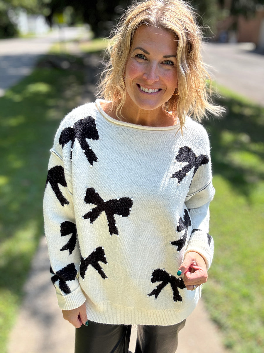 The Holly Bow Sweater