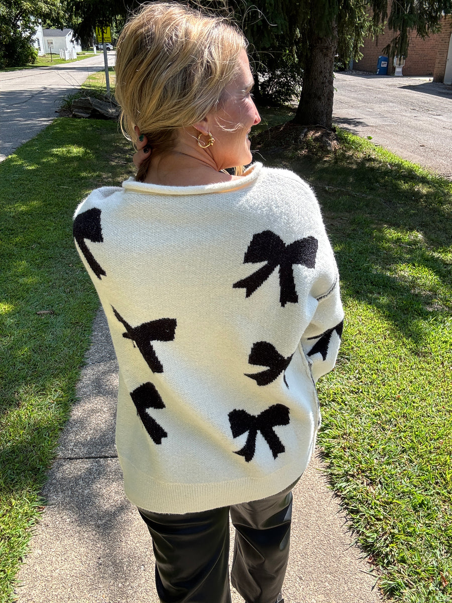 The Holly Bow Sweater